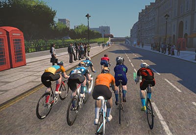 A group of seven computer animated cyclists riding through central London