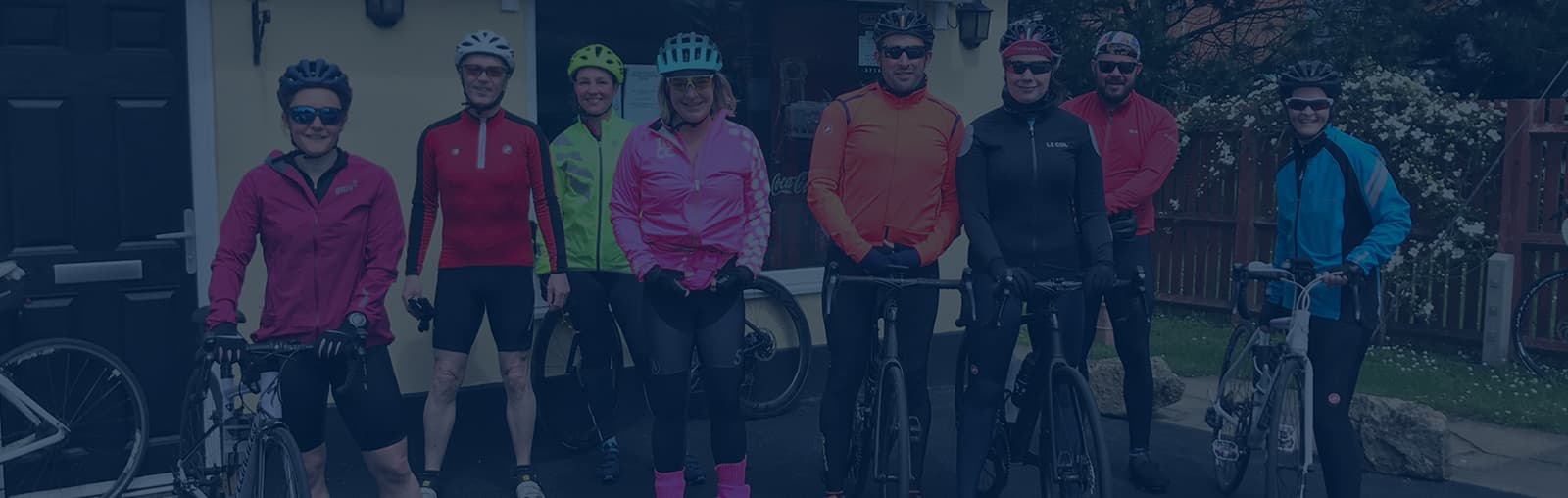 Previous academy cyclists celebrating the completion of the course.